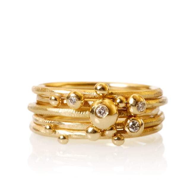 Sæt med 5 Delphis ringe. Guld 18 K med brillanter. Dulong Fine Jewelry