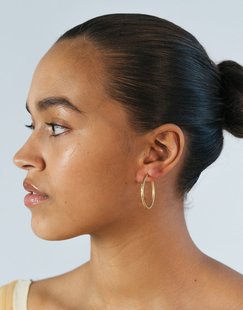 Esme øreringe. Stor, guld 18 K med 10 brillanter. Dulong Fine Jewelry