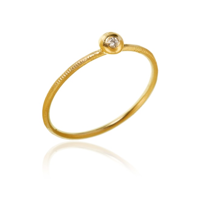 Delphis ring, style 2. Guld 18 K med en brillant. Dulong Fine Jewelry