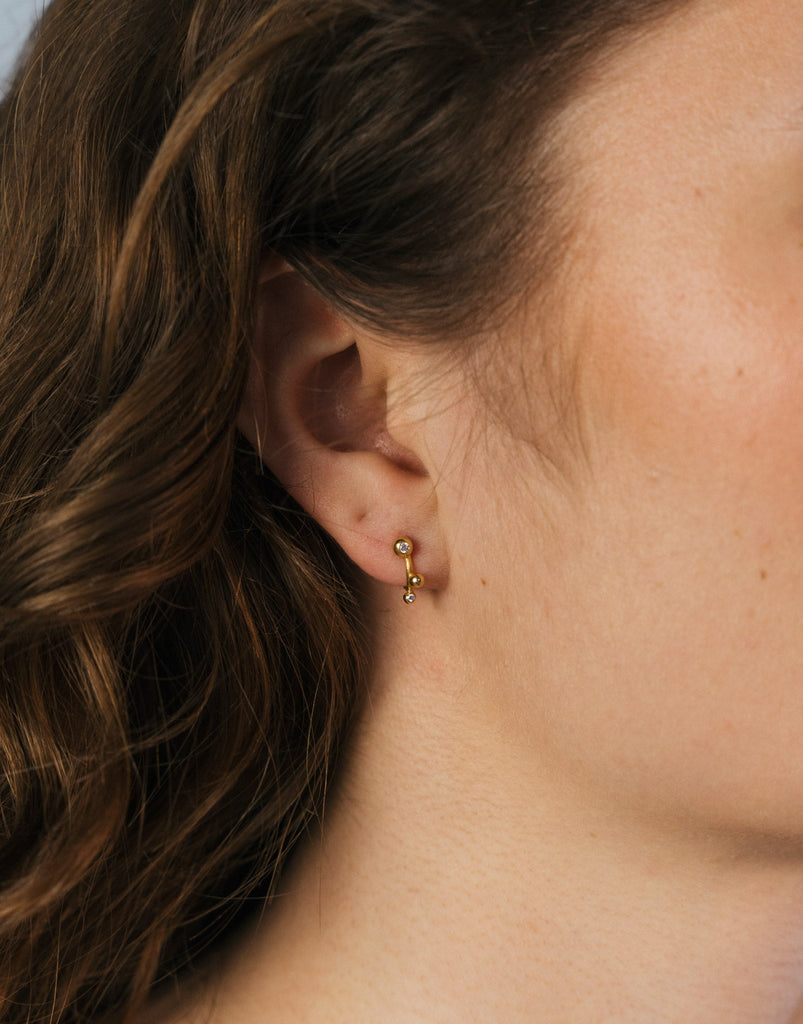 Delphis øreringe. Guld 18 K med brillanter. Dulong Fine Jewelry