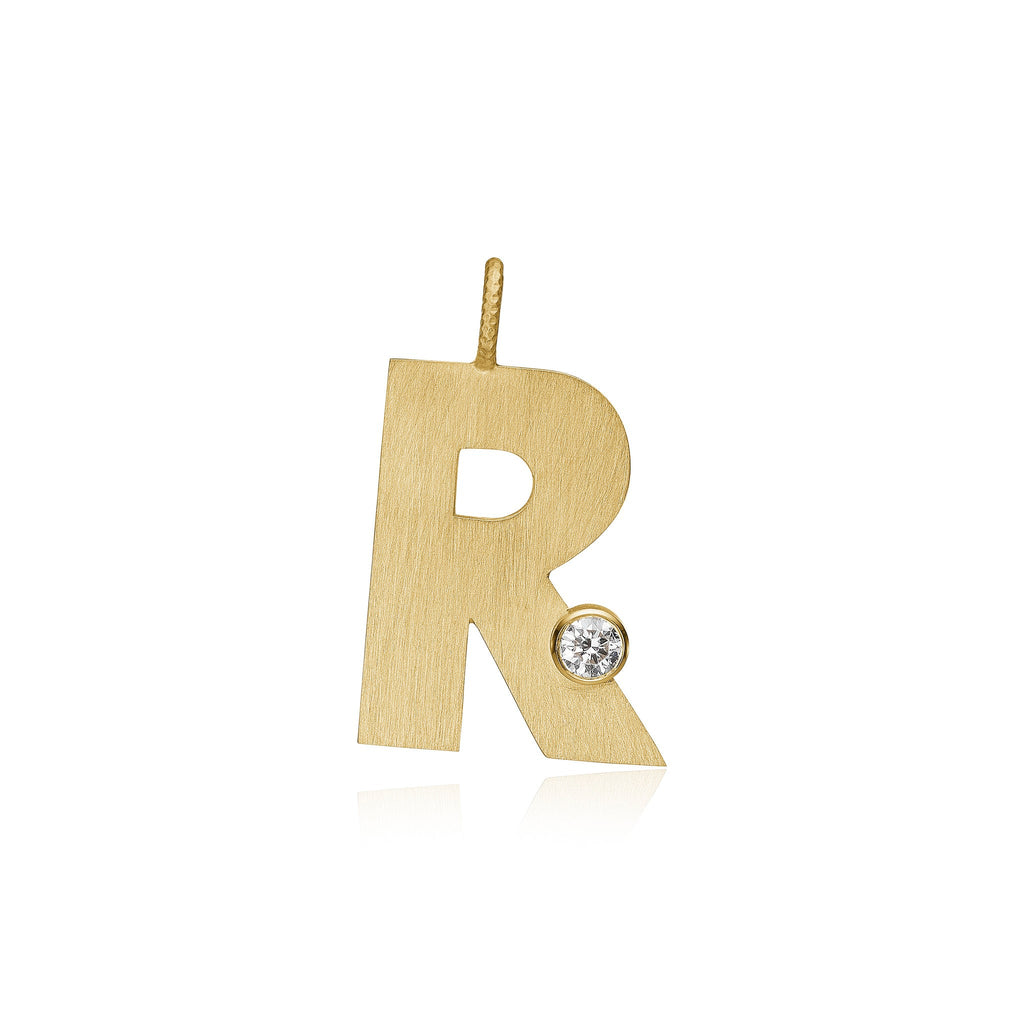 Letter R vedhæng. Bogstavvedhæng i guld 18 K med en brillant. Dulong Fine Jewelry