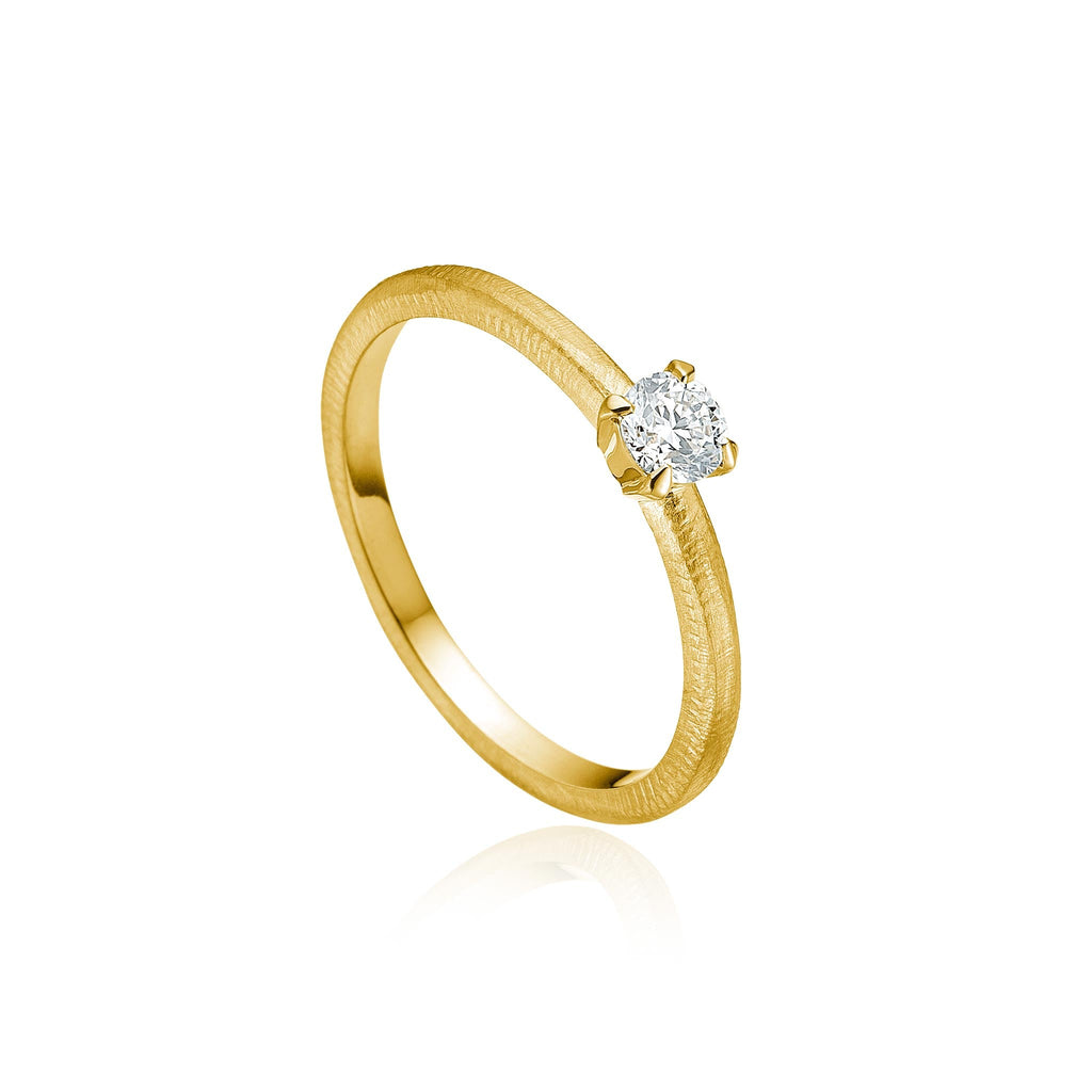 Lumina ring, 0,23 ct. Solitairering I guld 18 K med en brillantslebet diamant. Dulong Fine Jewelry