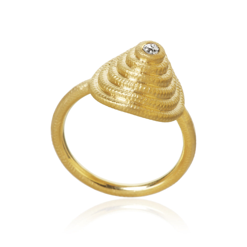 Thera Twist ring. Guld 18 K med en brillant. Dulong Fine Jewelry