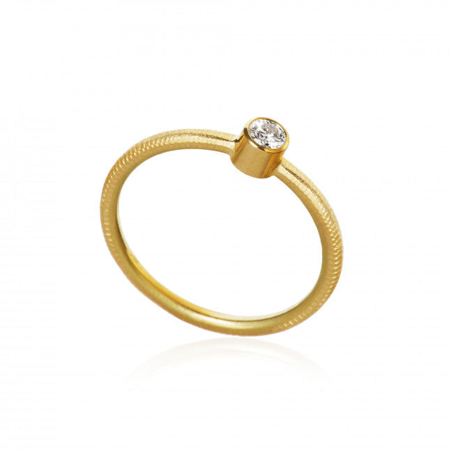 Forlovelsesring. Twinkle ring. Guld 18 K med en brillant. Dulong Fine Jewelry